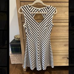 Black and white chevron V neck fit and flare dress